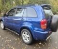 Синій Тойота РАВ 4, об'ємом двигуна 2 л та пробігом 230 тис. км за 5999 $, фото 4 на Automoto.ua