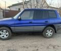 Синий Тойота РАВ 4, объемом двигателя 2 л и пробегом 330 тыс. км за 4800 $, фото 2 на Automoto.ua