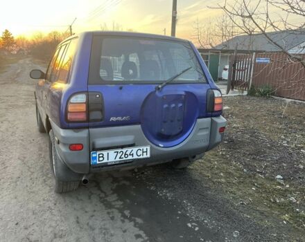 Синий Тойота РАВ 4, объемом двигателя 2 л и пробегом 330 тыс. км за 4800 $, фото 1 на Automoto.ua