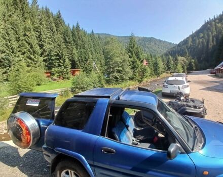 Синій Тойота РАВ 4, об'ємом двигуна 2 л та пробігом 300 тис. км за 5950 $, фото 4 на Automoto.ua