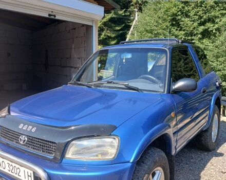 Синій Тойота РАВ 4, об'ємом двигуна 2 л та пробігом 300 тис. км за 5950 $, фото 2 на Automoto.ua