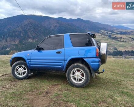 Синий Тойота РАВ 4, объемом двигателя 2 л и пробегом 337 тыс. км за 5300 $, фото 4 на Automoto.ua