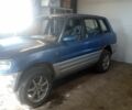 Синий Тойота РАВ 4, объемом двигателя 2 л и пробегом 200 тыс. км за 2100 $, фото 2 на Automoto.ua