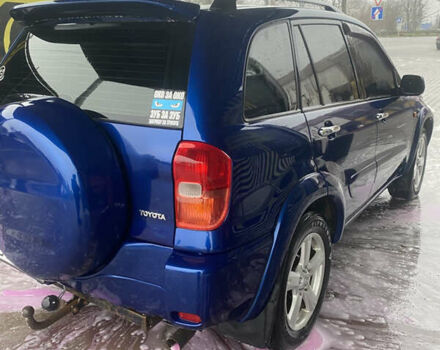 Синій Тойота РАВ 4, об'ємом двигуна 2 л та пробігом 244 тис. км за 6800 $, фото 10 на Automoto.ua