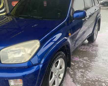 Синій Тойота РАВ 4, об'ємом двигуна 2 л та пробігом 244 тис. км за 6800 $, фото 3 на Automoto.ua