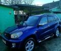Синий Тойота РАВ 4, объемом двигателя 2 л и пробегом 226 тыс. км за 7000 $, фото 1 на Automoto.ua