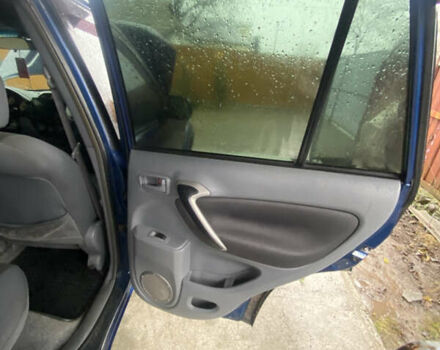 Синій Тойота РАВ 4, об'ємом двигуна 2 л та пробігом 244 тис. км за 6800 $, фото 34 на Automoto.ua