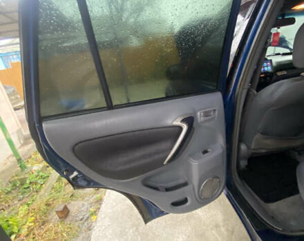 Синій Тойота РАВ 4, об'ємом двигуна 2 л та пробігом 244 тис. км за 6800 $, фото 30 на Automoto.ua