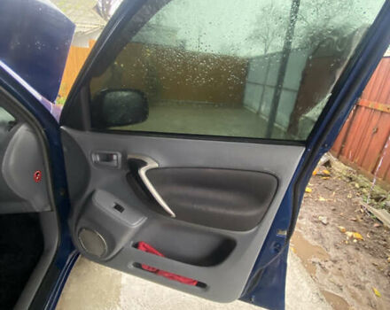 Синій Тойота РАВ 4, об'ємом двигуна 2 л та пробігом 244 тис. км за 6800 $, фото 33 на Automoto.ua