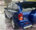Синій Тойота РАВ 4, об'ємом двигуна 2 л та пробігом 244 тис. км за 6800 $, фото 6 на Automoto.ua