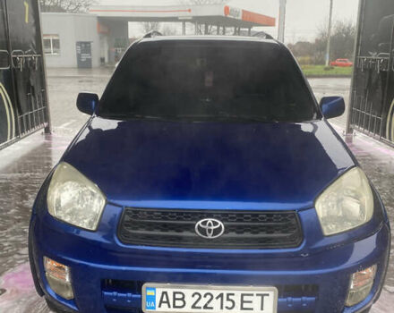 Синій Тойота РАВ 4, об'ємом двигуна 2 л та пробігом 244 тис. км за 6800 $, фото 1 на Automoto.ua