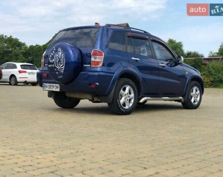 Синій Тойота РАВ 4, об'ємом двигуна 2 л та пробігом 307 тис. км за 6200 $, фото 6 на Automoto.ua