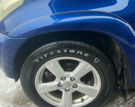 Синій Тойота РАВ 4, об'ємом двигуна 2 л та пробігом 244 тис. км за 6800 $, фото 4 на Automoto.ua