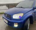 Синій Тойота РАВ 4, об'ємом двигуна 2 л та пробігом 244 тис. км за 6800 $, фото 1 на Automoto.ua