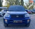 Синий Тойота РАВ 4, объемом двигателя 2 л и пробегом 238 тыс. км за 7000 $, фото 1 на Automoto.ua