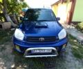Синий Тойота РАВ 4, объемом двигателя 2 л и пробегом 373 тыс. км за 6500 $, фото 1 на Automoto.ua