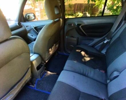 Синий Тойота РАВ 4, объемом двигателя 2 л и пробегом 373 тыс. км за 6500 $, фото 5 на Automoto.ua