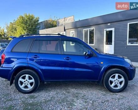 Синий Тойота РАВ 4, объемом двигателя 2 л и пробегом 238 тыс. км за 7000 $, фото 3 на Automoto.ua