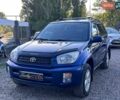 Синий Тойота РАВ 4, объемом двигателя 2 л и пробегом 238 тыс. км за 7000 $, фото 1 на Automoto.ua