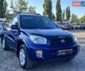 Синий Тойота РАВ 4, объемом двигателя 2 л и пробегом 238 тыс. км за 7000 $, фото 2 на Automoto.ua