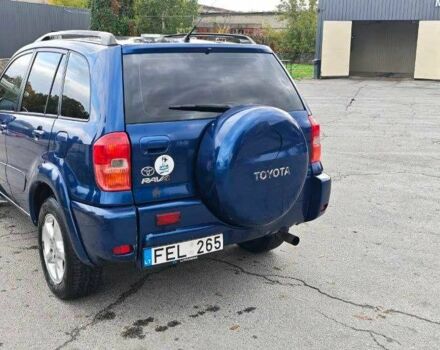 Синий Тойота РАВ 4, объемом двигателя 2 л и пробегом 280 тыс. км за 3700 $, фото 1 на Automoto.ua