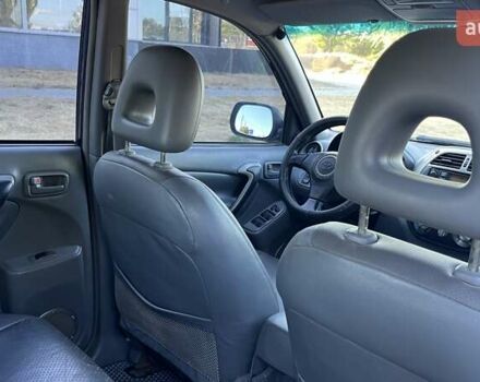 Синий Тойота РАВ 4, объемом двигателя 2 л и пробегом 268 тыс. км за 5990 $, фото 11 на Automoto.ua