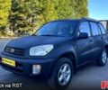 Синий Тойота РАВ 4, объемом двигателя 2 л и пробегом 268 тыс. км за 5590 $, фото 1 на Automoto.ua