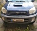 Синий Тойота РАВ 4, объемом двигателя 2 л и пробегом 323 тыс. км за 4999 $, фото 1 на Automoto.ua