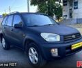 Синий Тойота РАВ 4, объемом двигателя 2 л и пробегом 268 тыс. км за 5590 $, фото 1 на Automoto.ua