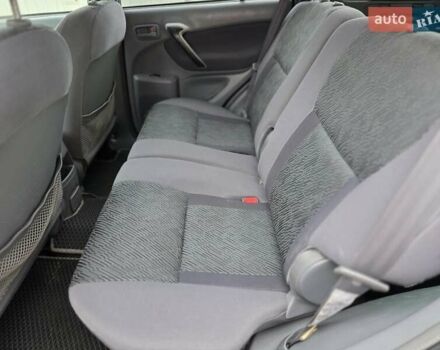 Синий Тойота РАВ 4, объемом двигателя 2 л и пробегом 134 тыс. км за 5900 $, фото 31 на Automoto.ua