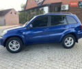 Синий Тойота РАВ 4, объемом двигателя 2 л и пробегом 235 тыс. км за 6900 $, фото 1 на Automoto.ua