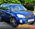 Синій Тойота РАВ 4, об'ємом двигуна 2 л та пробігом 249 тис. км за 5700 $, фото 1 на Automoto.ua