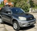 Синій Тойота РАВ 4, об'ємом двигуна 2 л та пробігом 245 тис. км за 2900 $, фото 2 на Automoto.ua
