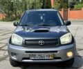 Синій Тойота РАВ 4, об'ємом двигуна 2 л та пробігом 245 тис. км за 2900 $, фото 1 на Automoto.ua