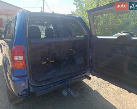 Синий Тойота РАВ 4, объемом двигателя 2 л и пробегом 400 тыс. км за 6700 $, фото 3 на Automoto.ua