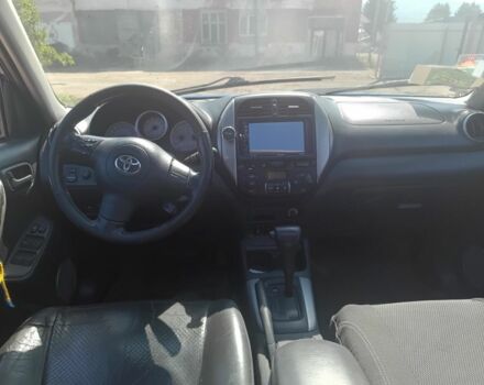 Синий Тойота РАВ 4, объемом двигателя 2 л и пробегом 320 тыс. км за 3400 $, фото 5 на Automoto.ua