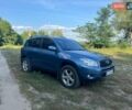 Синій Тойота РАВ 4, об'ємом двигуна 2 л та пробігом 236 тис. км за 8800 $, фото 1 на Automoto.ua
