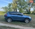 Синій Тойота РАВ 4, об'ємом двигуна 2 л та пробігом 236 тис. км за 8800 $, фото 2 на Automoto.ua
