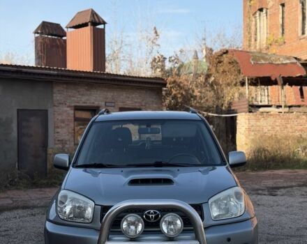 Синий Тойота РАВ 4, объемом двигателя 2 л и пробегом 313 тыс. км за 4350 $, фото 1 на Automoto.ua