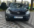 Синій Тойота РАВ 4, об'ємом двигуна 2 л та пробігом 243 тис. км за 8700 $, фото 1 на Automoto.ua