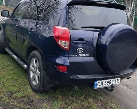 Синий Тойота РАВ 4, объемом двигателя 2 л и пробегом 239 тыс. км за 8800 $, фото 2 на Automoto.ua