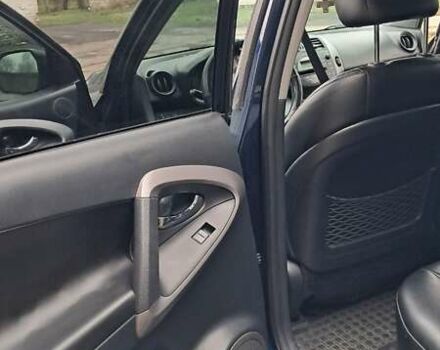 Синий Тойота РАВ 4, объемом двигателя 2 л и пробегом 239 тыс. км за 8800 $, фото 11 на Automoto.ua