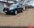 Синий Тойота РАВ 4, объемом двигателя 2.5 л и пробегом 250 тыс. км за 13000 $, фото 1 на Automoto.ua