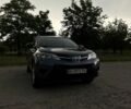 Синій Тойота РАВ 4, об'ємом двигуна 2.49 л та пробігом 237 тис. км за 13499 $, фото 1 на Automoto.ua