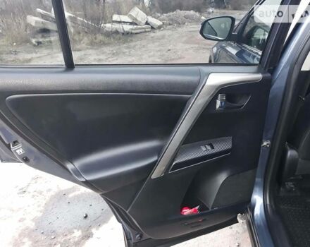 Синій Тойота РАВ 4, об'ємом двигуна 2 л та пробігом 253 тис. км за 16500 $, фото 19 на Automoto.ua