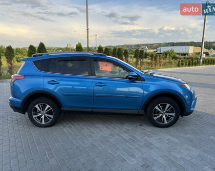 Синій Тойота РАВ 4, об'ємом двигуна 2.49 л та пробігом 77 тис. км за 18600 $, фото 1 на Automoto.ua