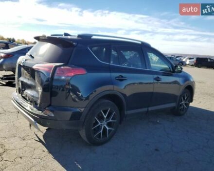 Синій Тойота РАВ 4, об'ємом двигуна 2.5 л та пробігом 58 тис. км за 6000 $, фото 2 на Automoto.ua