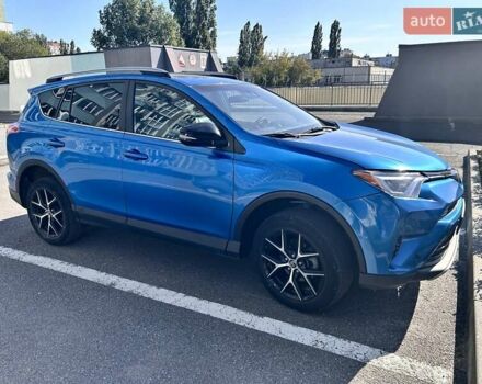 Синій Тойота РАВ 4, об'ємом двигуна 2.49 л та пробігом 106 тис. км за 24900 $, фото 1 на Automoto.ua
