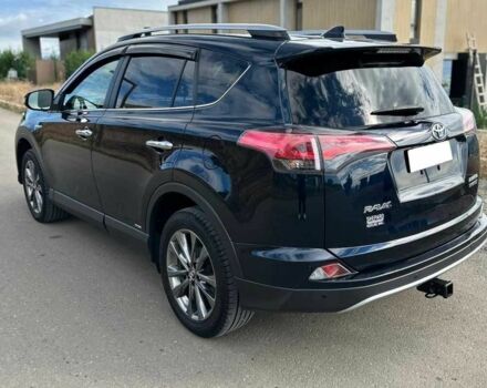 Синий Тойота РАВ 4, объемом двигателя 2.5 л и пробегом 106 тыс. км за 14700 $, фото 4 на Automoto.ua