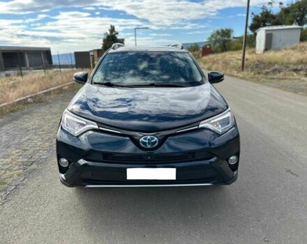 Синий Тойота РАВ 4, объемом двигателя 2.5 л и пробегом 106 тыс. км за 14700 $, фото 1 на Automoto.ua